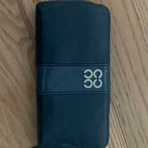 zip around wallet. Blue. Lots of compartments.